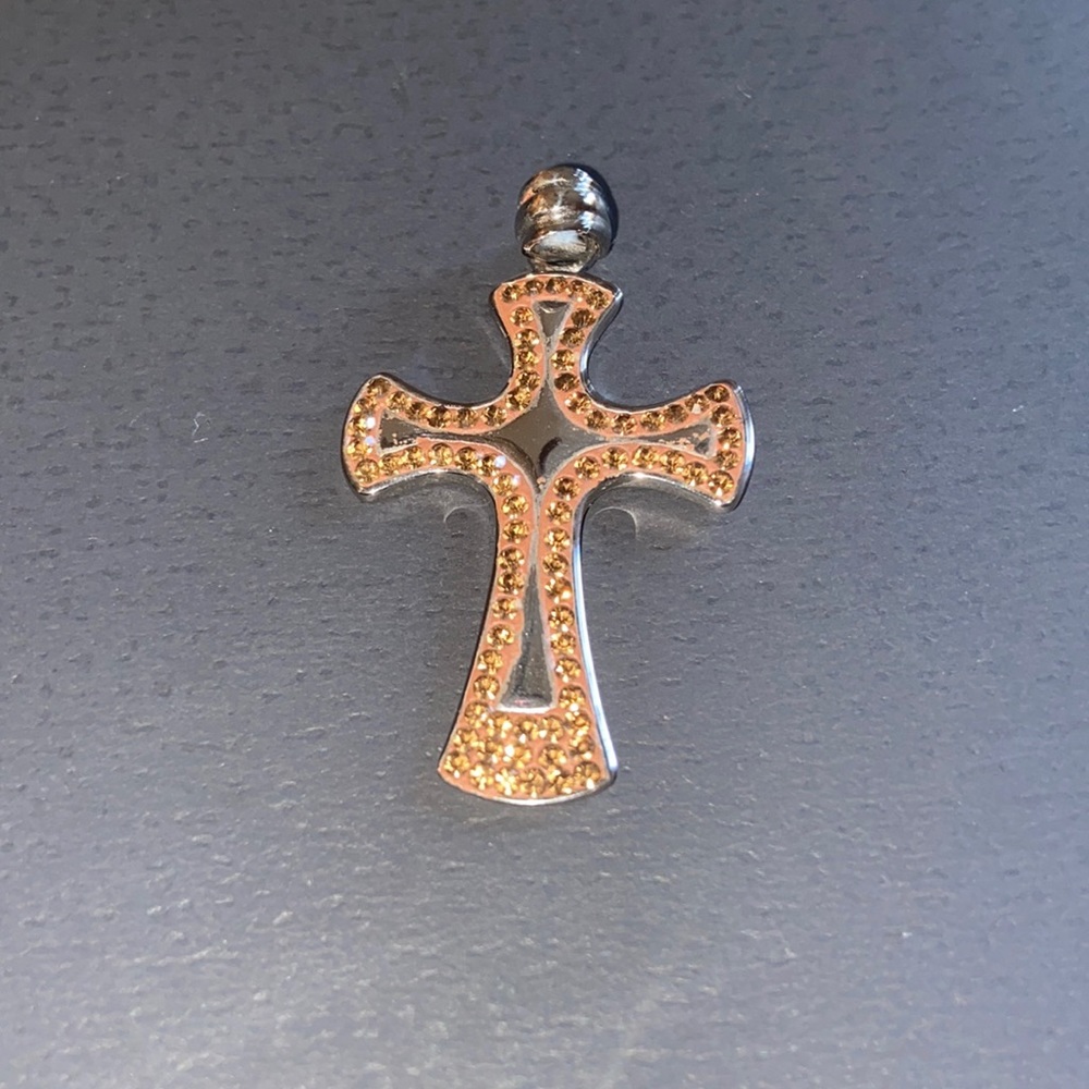 Stainless steel cross pendant with amber color stones